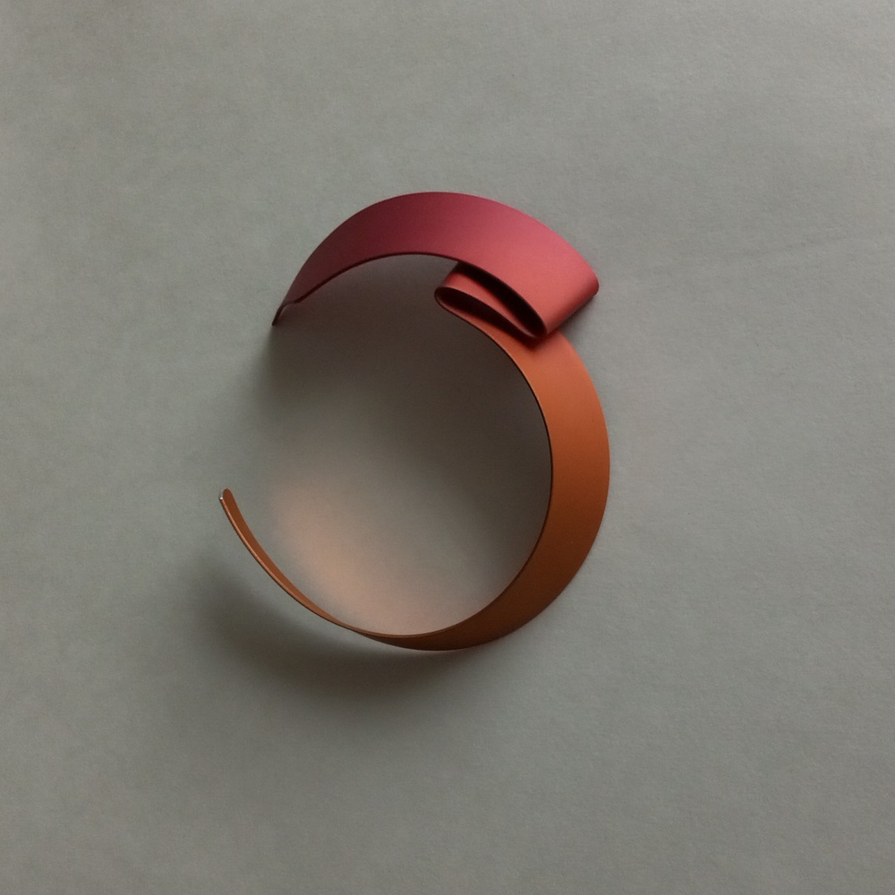 Chokers style neck piece in metallic orange and pink